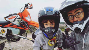 Rebekah Segura and here son riding dirt bikes.