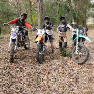 dirt bikers in the woods
