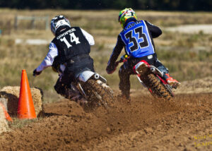 Todd Slavik riding motocross with Guy Cooper.