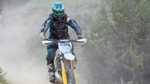 Dirt bike racers racing on a course.