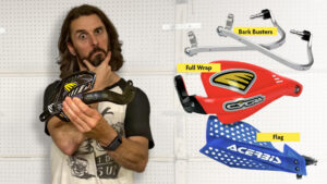 A comparison of the different types of dirt bike hand guards, including full wrap-around, open-ended, and flag styles.