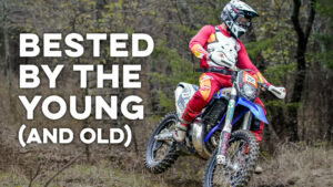Enduro racer shifting position into a turn.