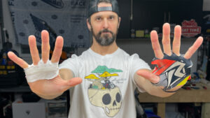 dirt biker showing his hand and palm protection