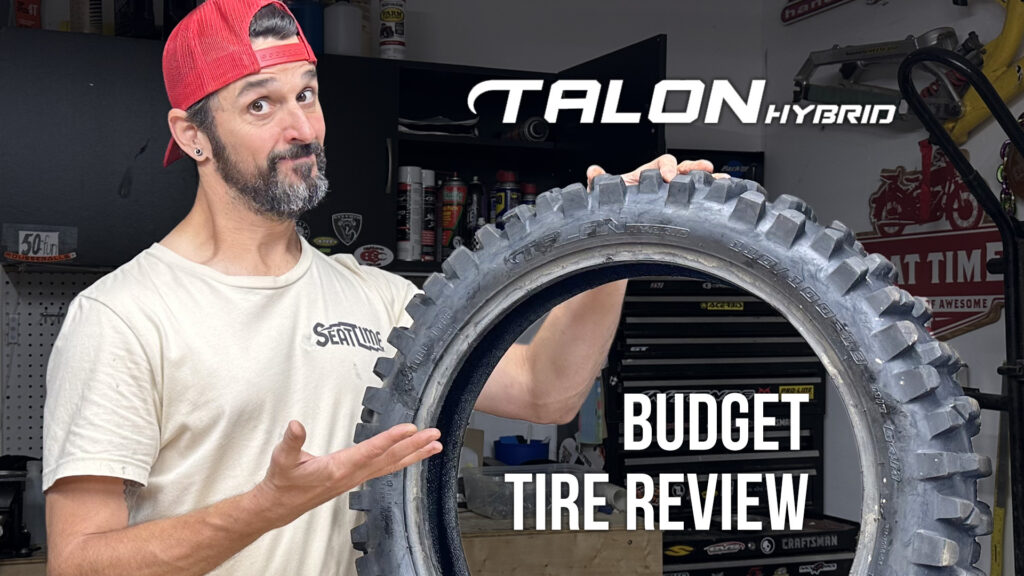 Product reviewer posing with the Tusk Talon Hybrid tire