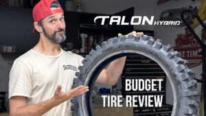 Product reviewer posing with the Tusk Talon Hybrid tire