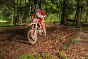 Dirt bike racer on a gasgas in the deep woods of Pennsylvania at the rattlesnake enduro.