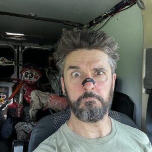 Brian Pierce looking at camera with lost stare after racing the rattlesnake enduro.