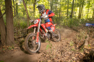 Enduro racer on GasGas EX350F navigating dusty conditions at the Muddobbers Enduro