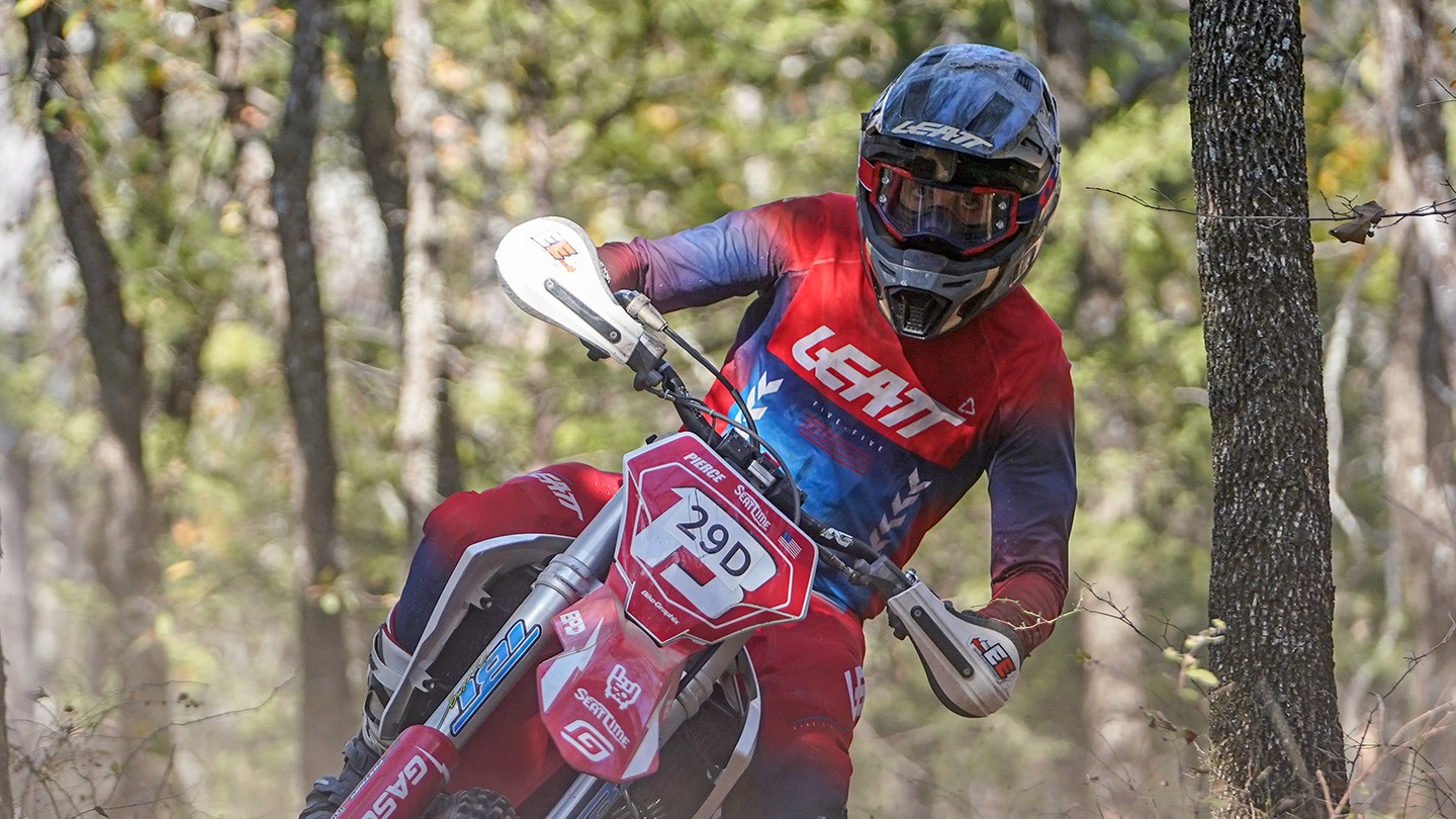 Enduro racer looking far ahead down the trail.