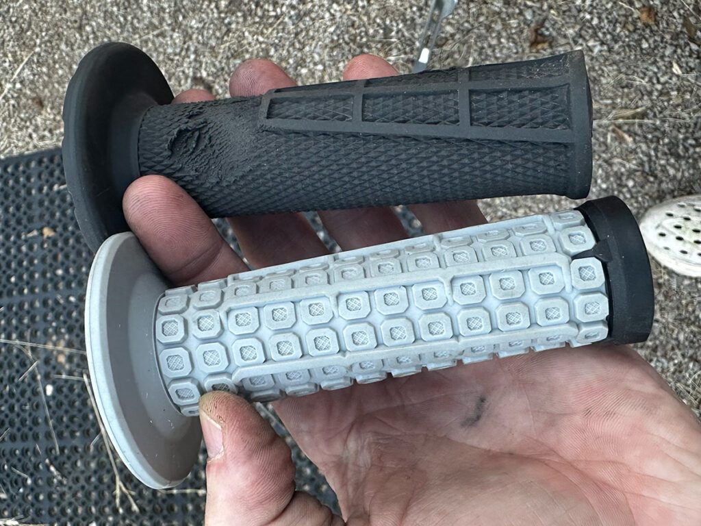 ODI lock-on dirt bike grips being compared next too each other.