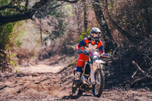 Fantic XE 300 two stroke tackling deep sand wash in Texas enduro