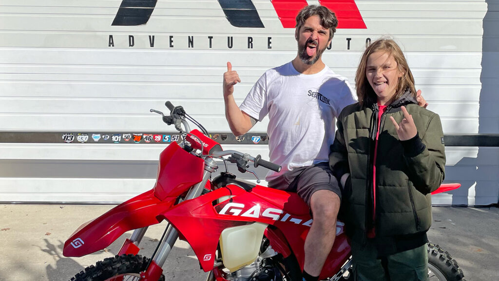 Excited dirt bikers showcasing their 350 four stroke setup guide.